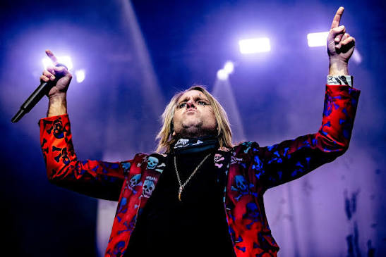 Three Days Grace performing on tour